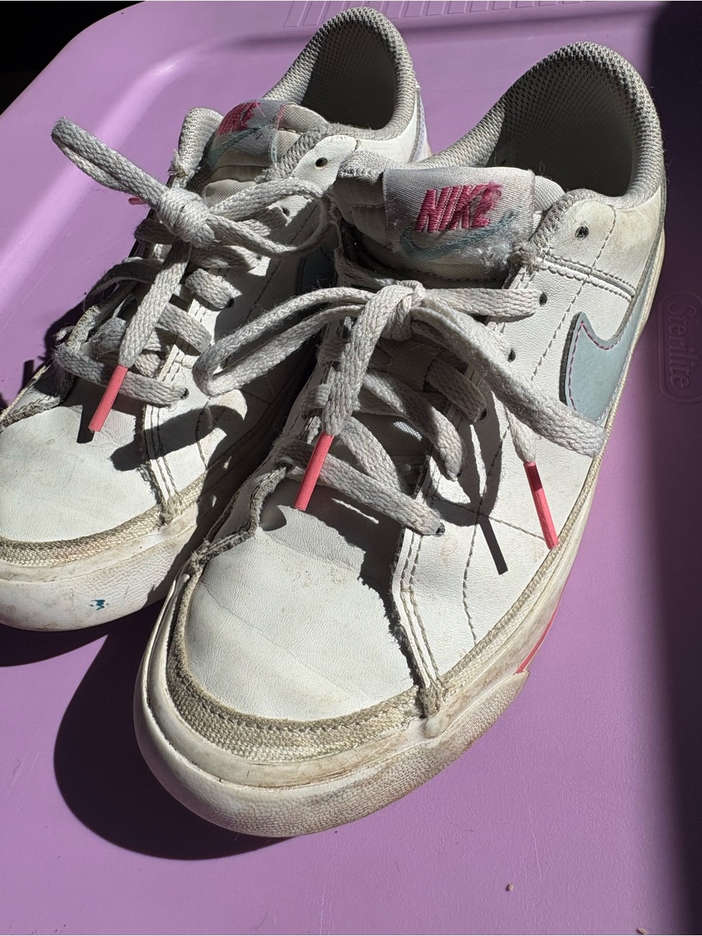 Nike White Sneakers with Pink Accents and Light Blue Swoosh